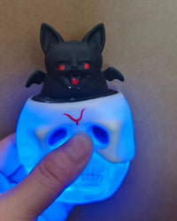 Glowing bat skull